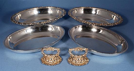 A pair of ornate Victorian oval silver plated entrée dishes with covers, length 278mm.